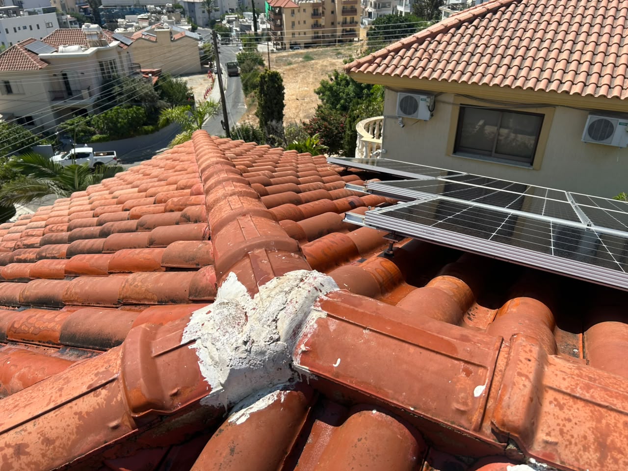 Roof tile ridge after cleaning and sealing, cleared of debris